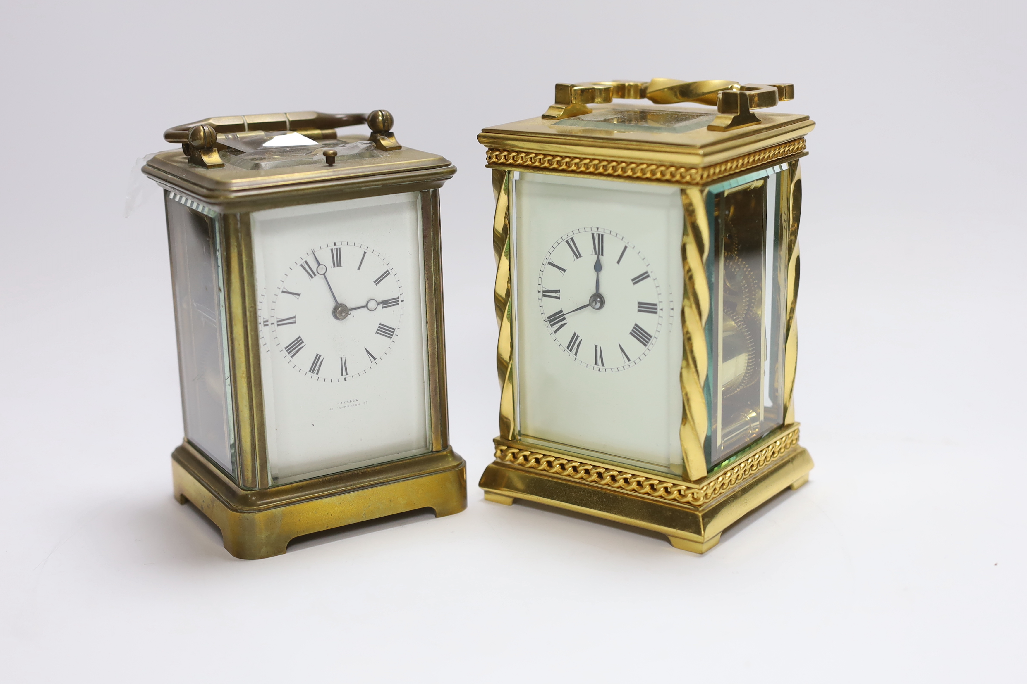 A French gilt brass cased carriage clock with twisted column supports, together with a further carriage clock, tallest 14cm (2)